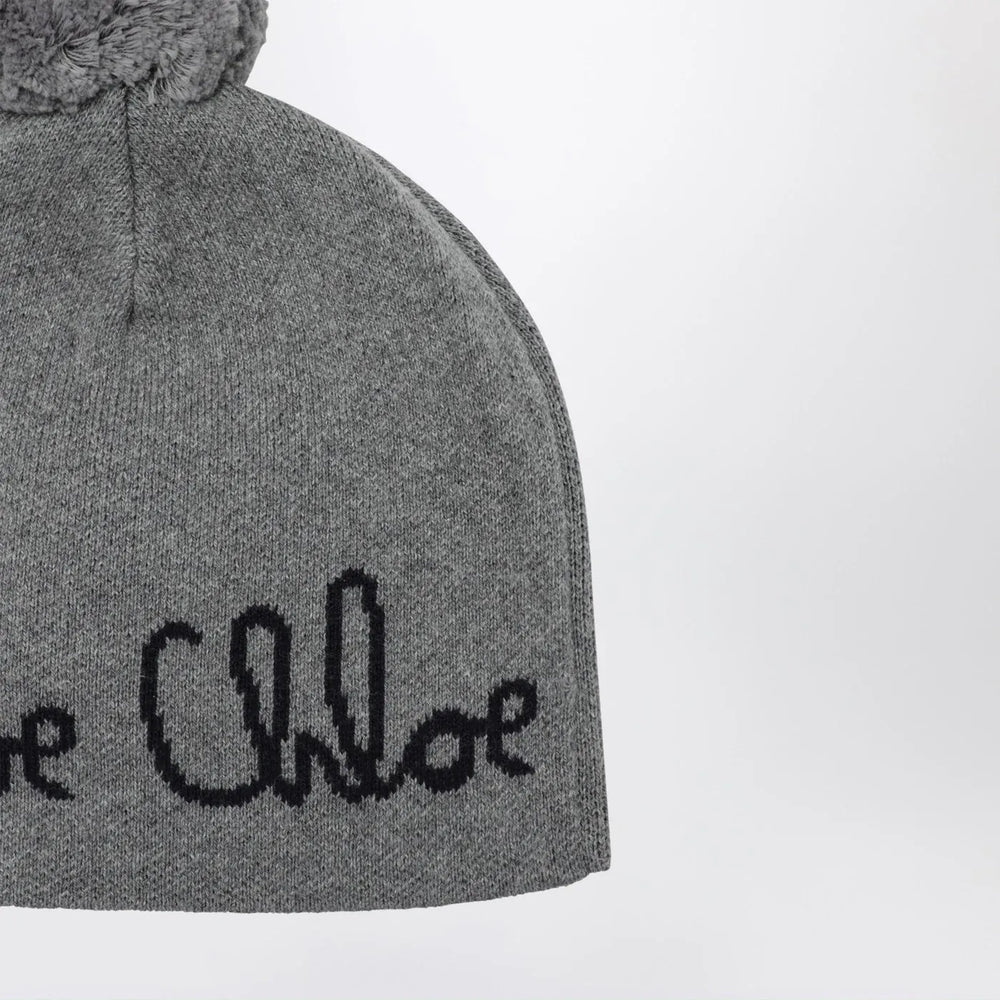 Chloé - Grey pom-pom beanie with logo Brand Apparel & Accessories > Clothing Accessories > Hats T1